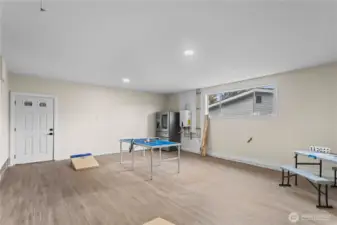Rec Room located just beyond the kitchen and family room.