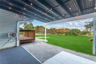 Rear covered patio with backyard view (grass edited)