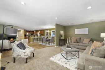 From the living room, looking into your dining room, kitchen, and part of the back deck.