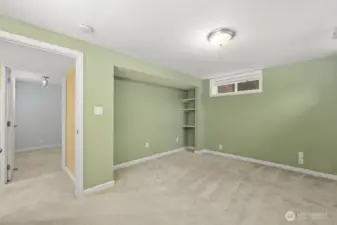 One of two bedrooms downstairs.