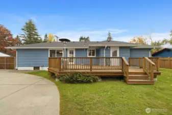 Enjoy your deck with easy access to the dining area, kitchen, and then to the yard as well.