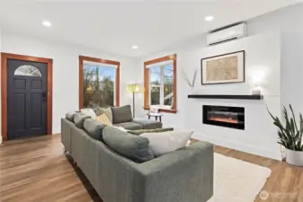 Cozy fireplace, and bay window...notice the mini-split for A/C!