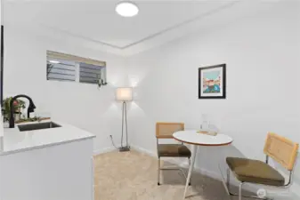 This could be a mini-kitchen space?  Already has a wet bar sink.