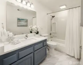 Updated bathroom with ample storage.