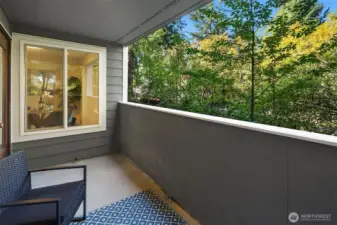Covered balcony offering additional living space.