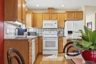 This kitchen has all recently updated appliances (except the microwave) and the granite counter and oak cabinets are loke brand new!