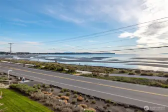 This is the view from your oversized lanai...beach, water, and sunsets year round. Birch Bay is widely recognized as the “home of the Northwest’s best sunsets,” thanks to its west-facing shoreline and panoramic views of the San Juan Islands and coastal mountains.