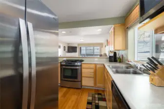 Views of the water from the kitchen window, and looking out through the slider.