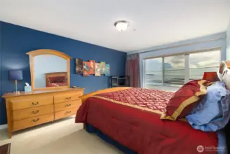 The windows in the primary suite look like a painting - you could be waking up to that view every day.