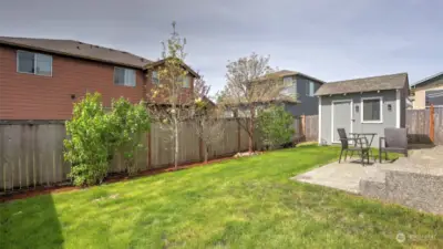 Spacious yard with flower beds and plenty of space for lawn activities!