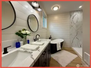 Primary 4-piece bathroom.  Oh how sweet! Dual sinks, soaking tub, shower, and water closet.