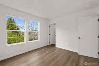 This secondary bedroom also features a walk-in closet!