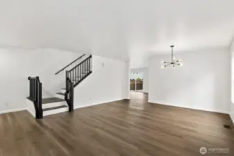 Another perspective of the open-concept living and dining areas.