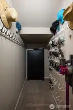 Large main floor closet with lots of storage, organizer for misc. items.