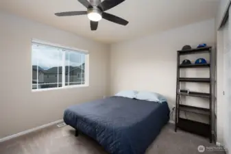 Large 2nd Bedroom with ceiling fan.