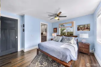 Primary bedroom with walk-in closet behind the blue door