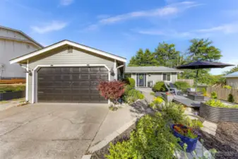 2 car garage with extra parking to the left