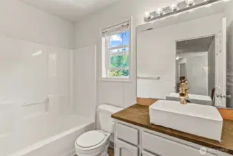 Full Bathroom at the top of the stairs