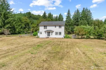 Back of home with amazing level 2 +/- acres!