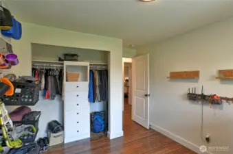 Another bedroom with built in custom cabinets