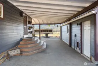 Covered entryway between home and garage is perfect for Northwest winters.