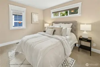 The second bedroom on the other wing of the home is private and flexible - equally well-suited for a craft, exercise, or office space.