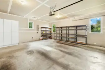 The two-car garage has plenty of room for storage, gear, and electric bikes.
