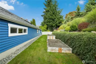 This easy care property has two large garden beds with excellent sun exposure. With fencing in the backyard, this space also makes for a great dog run.