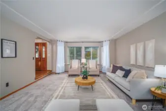 Enjoy the front-facing picture windows and the elegant recessed ceiling.