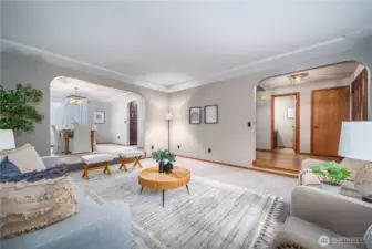 Another view showcasing the inviting entryway and formal dining room.