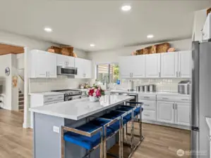 Entering the Refrigerator While Guest sits at the Island Provides Ample Maneuverability.