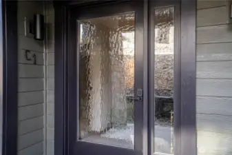 Frosted clearlight glass front door for privacy and light.