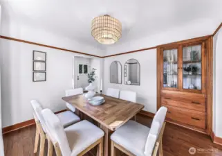 Full size dining room with original built ins. Dining leads into gourmet kitchen.