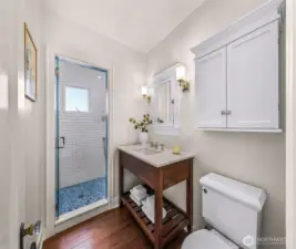 Main floor bath with beautiful tiled shower.