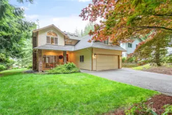 Tucked away in a small cul-de-sac with a totally flat lot and driveway.