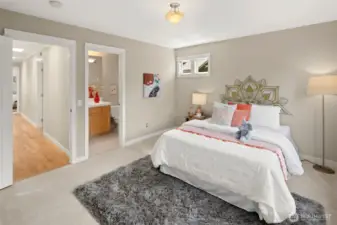 Whether it's for guests, kids, or a home office, this secondary bedroom with its own bath and lovely natural light offers flexible functionality.