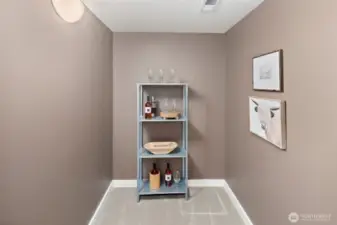 Also on the lower level is this flexible space - making a great wine storage area or petite office with just enough space to personalize.