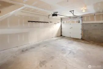 The attached garage offers secure parking for one vehicle along with loads of extra storage space.