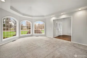 Formal living room with lots of natural light