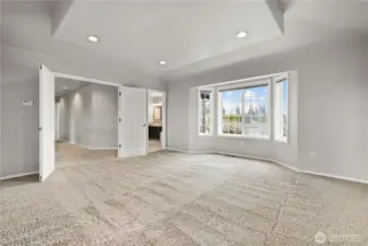 Oversized primary bedroom with bath