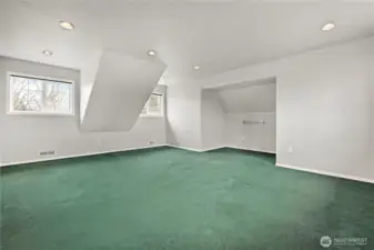 Large loft space with extra room for other bedroom
