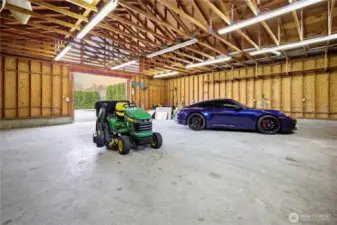 6 car garage. Lawn mower included with sale