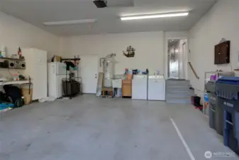 2 car attached garage with the washer and dryer
