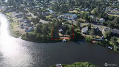 Drone shot of property plus the boat dock
