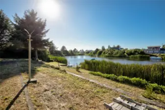 Looking west from your back yard. Wonderful water to kayak, paddle board, pontoon boat and much more.