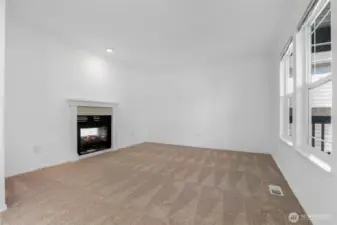 Front room with double-sided gas fireplace