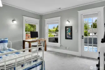 The NW corner bedroom has its own sunny deck.