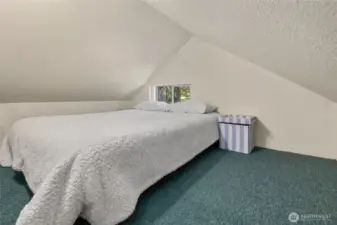 Bonus room/sleeping space above the kitchen via drop-down ladder!