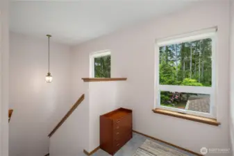Stair landing. Low maintenance Milgard windows!