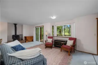 Great room that has a second sliding door leading to the trex deck.